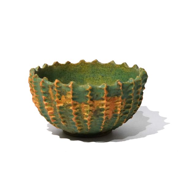 Zielona miska stylizowana na kaktus.